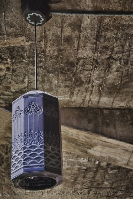 Etching Autumnal Purple hanging lamp against sepia background