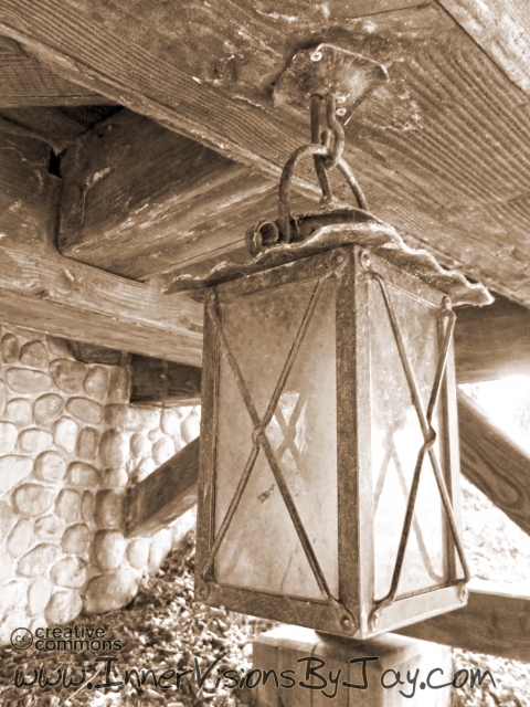 Antique lantern below a decommissioned railway