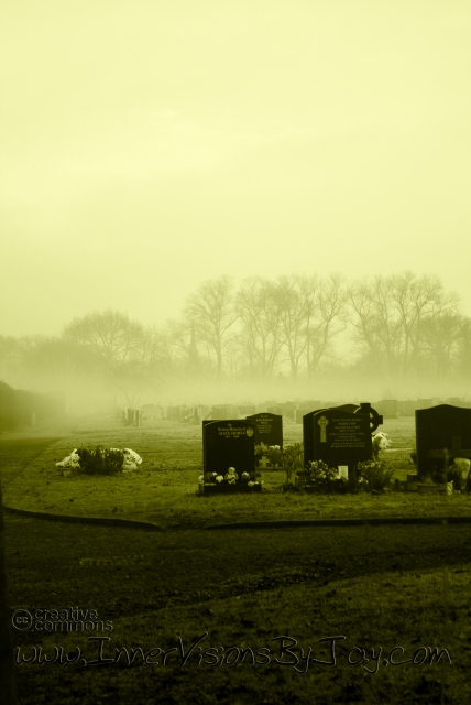 Mist Immemorial - Yellow-toned graveyard with morning mist covering tombstones