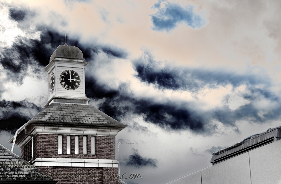 Reckoning Churchyard clock against roiling clouds