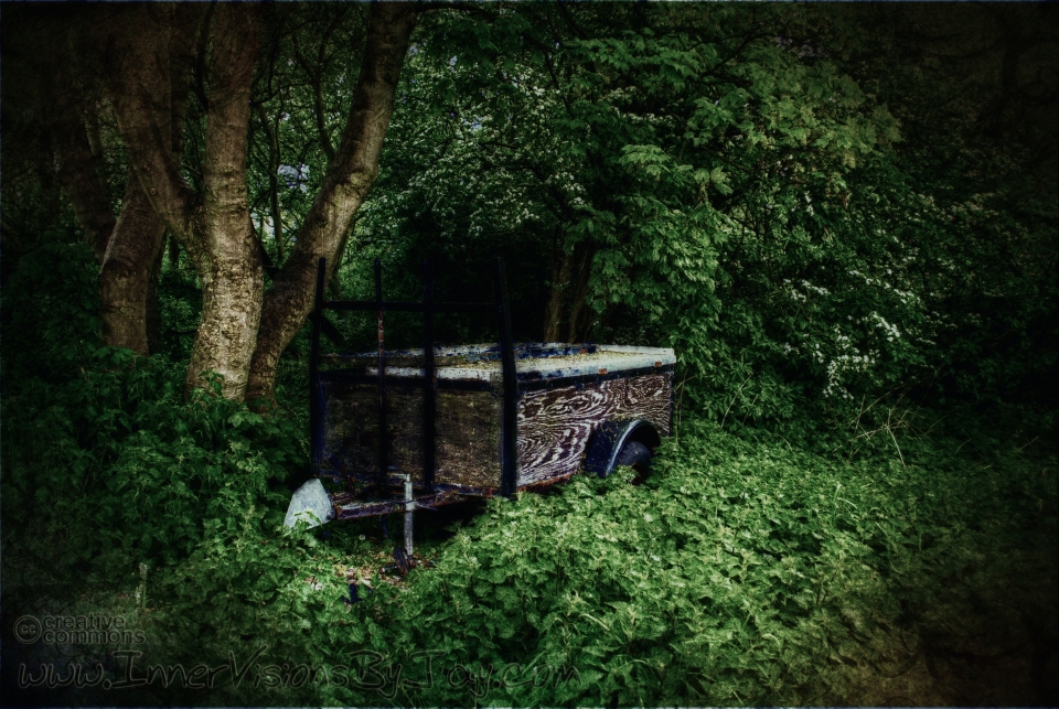 Seer's Opulence Detached trailer faded and reclaimed by the forest